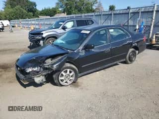 2000 Honda Accord LX z VIN 1HGCG6652YA142596, wystawiony jako Copart lot #80483945 z przebiegiem 376 012 mil mil oraz Szkoda całkowita • Salvage title. Historia ofert i sprzedaży dostępna na DreamBid. Obrazek 1.