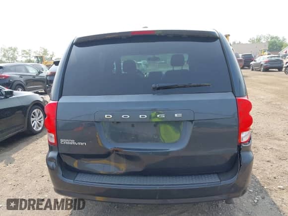 2014 Dodge Grand Caravan SXT with VIN 2C4RDGCG1ER463209, listed as a IAAI auction lot 42403781 with 79,387 mi miles and . Bid and sale history available at DreamBid. Image 16.