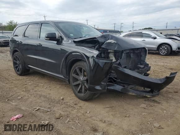 2013 Dodge Durango R/T with VIN 1C4SDJCT2DC520987, listed as a Copart auction lot 71071205 with 181,901 mi miles and Salvage title. Bid and sale history available at DreamBid. Image 4.