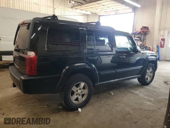2006 Jeep Commander z VIN 1J8HG48K26C105120, wystawiony jako Copart lot #71102185 z przebiegiem 233 665 mil mil oraz Szkoda całkowita • Salvage title. Historia ofert i sprzedaży dostępna na DreamBid. Obrazek 3.