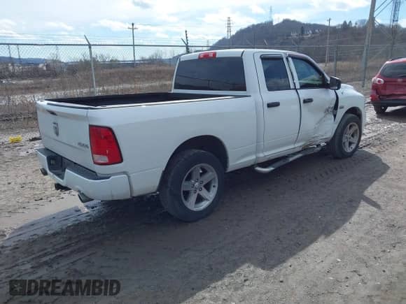 2015 Ram 1500 ST with VIN 1C6RR7FT5FS656612, listed as a IAAI auction lot 41666701 with 152,509 mi miles and . Bid and sale history available at DreamBid. Image 4.