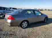 2006 Honda Accord EX-L with VIN 1HGCM56816A153311, listed as a Copart auction lot 82170525 with 70,009 mi miles and Salvage title. Bid and sale history available at DreamBid. Image 3.