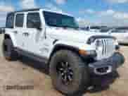 2022 Jeep Wrangler Unlimited Sahara z VIN 1C4HJXEN5NW144922, wystawiony jako IAAI lot #42452901 z przebiegiem 51 223 mil mil oraz . Historia ofert i sprzedaży dostępna na DreamBid. Obrazek 1.