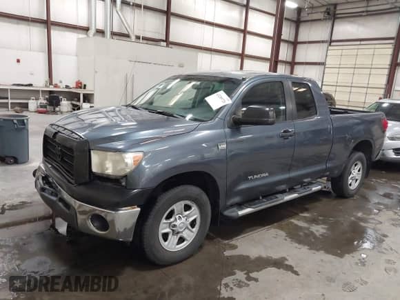2008 Toyota Tundra z VIN 5TFRT54198X023567, wystawiony jako IAAI lot #43289726 z przebiegiem 185 308 mil mil oraz . Historia ofert i sprzedaży dostępna na DreamBid. Obrazek 18.