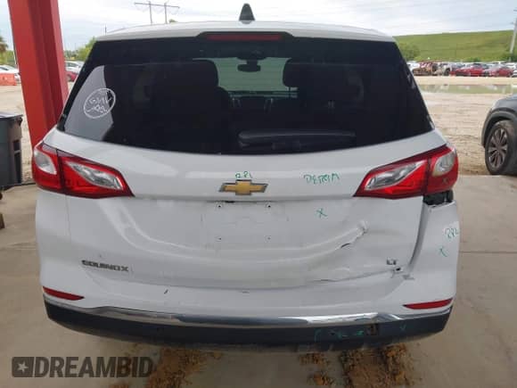 2021 Chevrolet Equinox LT with VIN 2GNAXJEV7M6158995, listed as a IAAI auction lot 43254877 with 84,928 mi miles and . Bid and sale history available at DreamBid. Image 16.