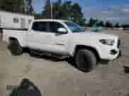2022 Toyota Tacoma SR5 with VIN 3TMDZ5BN5NM131314, listed as a Copart auction lot 81847585 with 125,407 mi miles and Salvage title. Bid and sale history available at DreamBid. Image 4.