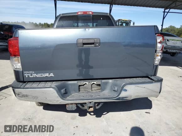 2010 Toyota Tundra z VIN 5TFRY5F15AX097623, wystawiony jako Copart lot #89992165 z przebiegiem 153 318 mil mil oraz Szkoda całkowita • Salvage title. Historia ofert i sprzedaży dostępna na DreamBid. Obrazek 6.