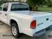 2004 Dodge Dakota Sport с VIN 1D7HL38K24S639420, выставлен на аукционе Copart как лот 64867545 с пробегом 120 018 миль миль и Чистый • Clean title. История ставок и продаж доступна на DreamBid. Изображение 3.