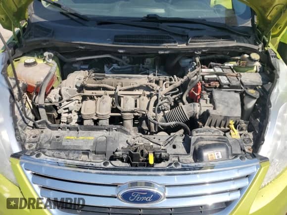 2012 Ford Fiesta SE with VIN 3FADP4BJ9CM112085, listed as a Copart auction lot 69342315 with 143,753 mi miles and Salvage title. Bid and sale history available at DreamBid. Image 11.
