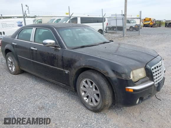 2006 Chrysler 300 C with VIN 2C3KK63H46H263690, listed as a IAAI auction lot 43401520 with 156,740 mi miles and . Bid and sale history available at DreamBid. Image 1.