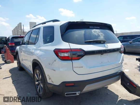 2025 Honda Pilot Touring с VIN 5FNYG2H76SB030457, выставлен на аукционе IAAI как лот 42471743 с пробегом 3 132 миль миль и . История ставок и продаж доступна на DreamBid. Изображение 3.