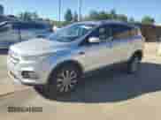 2017 Ford Escape Titanium with VIN 1FMCU9J98HUE25145, listed as a Copart auction lot 86802075 with 156,471 mi miles and Clean title. Bid and sale history available at DreamBid. Image 1.