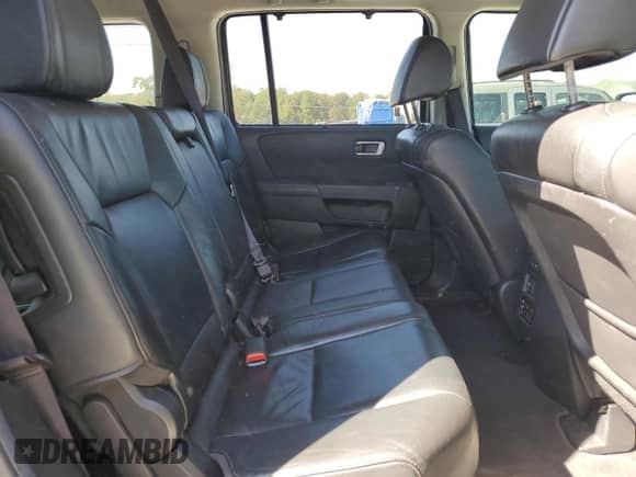 2012 Honda Pilot Touring with VIN 5FNYF3H97CB016448, listed as a Copart auction lot 82044975 with 154,055 mi miles and Salvage title. Bid and sale history available at DreamBid. Image 11.