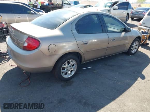 2000 Dodge Neon Highline z VIN 1B3ES46C5YD722773, wystawiony jako IAAI lot #43142303 z przebiegiem 91 601 mil mil oraz . Historia ofert i sprzedaży dostępna na DreamBid. Obrazek 4.