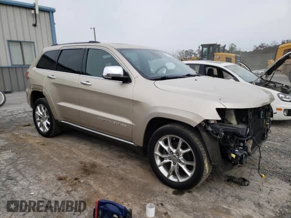 2014 Jeep Grand Cherokee Summit с VIN 1C4RJFJG7EC337791, выставлен на аукционе Copart как лот 83995585 с пробегом 91 152 миль миль и Списание • Salvage title. История ставок и продаж доступна на DreamBid. Изображение 4.