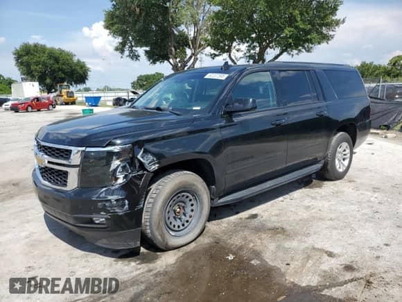 2019 Chevrolet Suburban Premier with VIN 1GNSKJKJ4KR131551, listed as a Copart auction lot 60237595 with 132,270 mi miles and Salvage title. Bid and sale history available at DreamBid. Image 1.