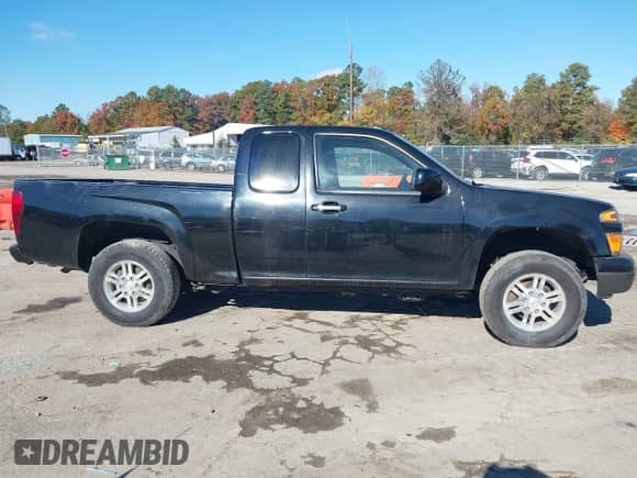 2012 Chevrolet Colorado 1LT z VIN 1GCJTCFE0C8135615, wystawiony jako IAAI lot #43597245 z przebiegiem 114 844 mil mil oraz . Historia ofert i sprzedaży dostępna na DreamBid. Obrazek 13.