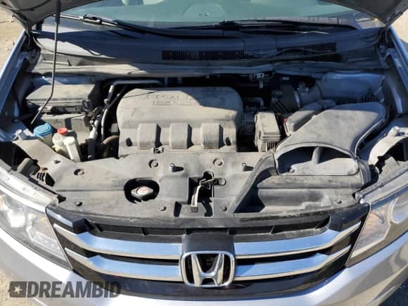 2016 Honda Odyssey EX with VIN 5FNRL5H44GB084662, listed as a Copart auction lot 87011705 with 87,495 mi miles and Salvage title. Bid and sale history available at DreamBid. Image 11.