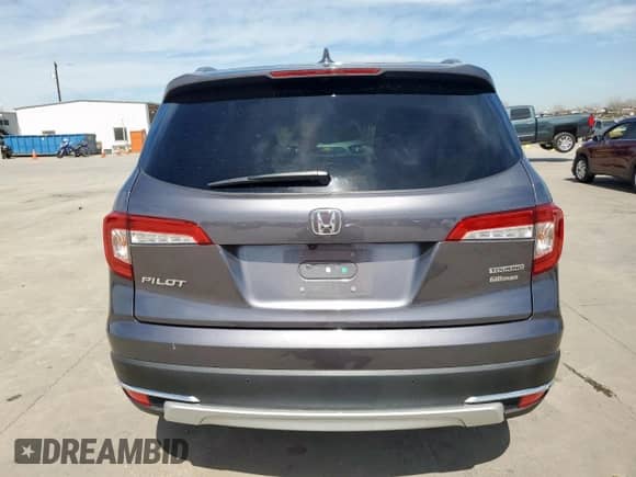 2021 Honda Pilot Touring 7-Passenger с VIN 5FNYF5H60MB014706, выставлен на аукционе Copart как лот 48984535 с пробегом 57 923 миль миль и Чистый • Clean title. История ставок и продаж доступна на DreamBid. Изображение 6.