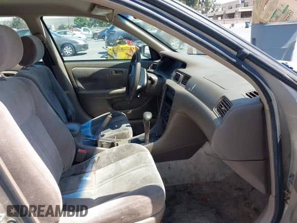 1999 Toyota Camry LE с VIN 4T1BG22K4XU504404, выставлен на аукционе IAAI как лот 43058844 с пробегом 214 196 миль миль и . История ставок и продаж доступна на DreamBid. Изображение 5.