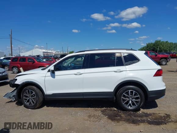 2021 Volkswagen Tiguan S with VIN 3VV0B7AX8MM079064, listed as a IAAI auction lot 42779983 with 45,315 mi miles and . Bid and sale history available at DreamBid. Image 14.