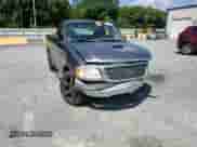 2003 Ford F-150 XL z VIN 1FTRF17W03NB81033, wystawiony jako Copart lot #69110375 z przebiegiem Nie podano mil oraz Szkoda całkowita • Salvage title. Historia ofert i sprzedaży dostępna na DreamBid. Obrazek 13.