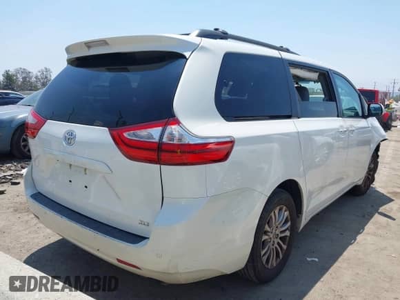 2015 Toyota Sienna XLE with VIN 5TDYK3DC8FS639719, listed as a IAAI auction lot 42753578 with 157,983 mi miles and . Bid and sale history available at DreamBid. Image 4.
