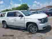 2015 Chevrolet Suburban LT z VIN 1GNSCJKC5FR587787, wystawiony jako IAAI lot #42801743 z przebiegiem Nie podano mil oraz . Historia ofert i sprzedaży dostępna na DreamBid. Obrazek 13.