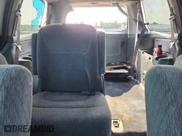 2002 Honda Odyssey LX with VIN 2HKRL18532H504584, listed as a Copart auction lot 67735975 with 230,708 mi miles and Salvage title. Bid and sale history available at DreamBid. Image 10.