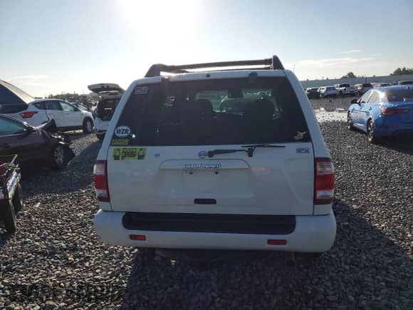 2003 Nissan Pathfinder SE z VIN JN8DR09Y53W814313, wystawiony jako Copart lot #69288685 z przebiegiem 147 612 mil mil oraz Szkoda całkowita • Salvage title. Historia ofert i sprzedaży dostępna na DreamBid. Obrazek 6.