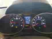 2012 Hyundai Veloster w/Red Int z VIN KMHTC6AD0CU027782, wystawiony jako Copart lot #81558205 z przebiegiem 104 484 mil mil oraz Szkoda całkowita • Salvage title. Historia ofert i sprzedaży dostępna na DreamBid. Obrazek 9.