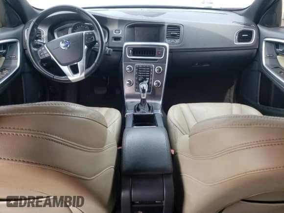 2015 Volvo S60 T5 Drive-E Platinum с VIN YV140MFM0F2355504, выставлен на аукционе Copart как лот 60310125 с пробегом 93 375 миль миль и Списание • Salvage title. История ставок и продаж доступна на DreamBid. Изображение 8.