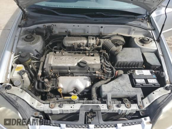 2004 Hyundai Accent GL z VIN KMHCG45C64U524377, wystawiony jako Copart lot #53976094 z przebiegiem 65 230 mil mil oraz Nie do naprawy • Non repairable. Historia ofert i sprzedaży dostępna na DreamBid. Obrazek 11.