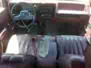 1990 Dodge Dakota z VIN 1B7FL23X0LS709073, wystawiony jako Copart lot #69897874 z przebiegiem 147 052 mil mil oraz Szkoda całkowita • Salvage title. Historia ofert i sprzedaży dostępna na DreamBid. Obrazek 8.