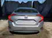 2016 Honda Civic LX z VIN 19XFC2F54GE081344, wystawiony jako Copart lot #43571544 z przebiegiem 118 096 mil mil oraz Czysty tytuł • Clean title. Historia ofert i sprzedaży dostępna na DreamBid. Obrazek 6.