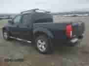 2007 Nissan Frontier LE with VIN 1N6AD07W17C401906, listed as a Copart auction lot 49831275 with 137,696 mi miles and Salvage title. Bid and sale history available at DreamBid. Image 2.