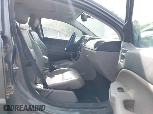 2011 Dodge Caliber Uptown with VIN 1B3CB9HB9BD254451, listed as a IAAI auction lot 42247772 with 188,757 mi miles and . Bid and sale history available at DreamBid. Image 5.