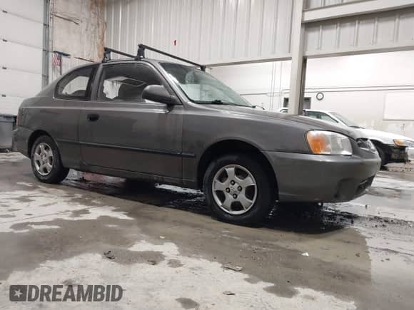 2002 Hyundai Accent z VIN KMHCF35G22U230228, wystawiony jako IAAI lot #43425125 z przebiegiem 185 744 mil mil oraz . Historia ofert i sprzedaży dostępna na DreamBid. Obrazek 1.