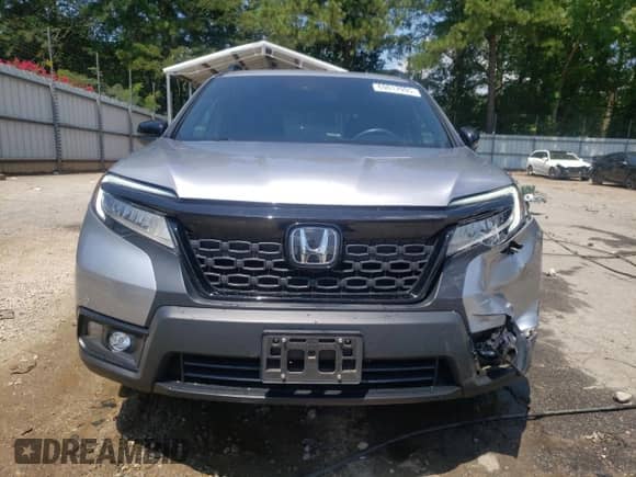 2020 Honda Passport Touring с VIN 5FNYF8H96LB011464, выставлен на аукционе Copart как лот 69017995 с пробегом 58 459 миль миль и Списание • Salvage title. История ставок и продаж доступна на DreamBid. Изображение 5.