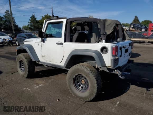 2015 Jeep Wrangler Rubicon z VIN 1C4BJWCG0FL695931, wystawiony jako Copart lot #70685724 z przebiegiem 72 740 mil mil oraz Szkoda całkowita • Salvage title. Historia ofert i sprzedaży dostępna na DreamBid. Obrazek 2.