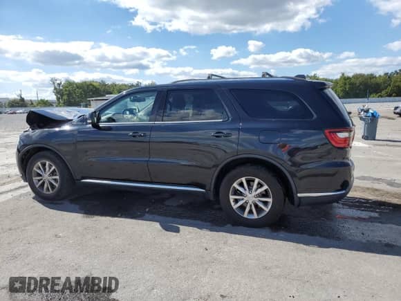 2015 Dodge Durango Limited with VIN 1C4RDHDG0FC244448, listed as a Copart auction lot 86769265 with 161,478 mi miles and Salvage title. Bid and sale history available at DreamBid. Image 2.