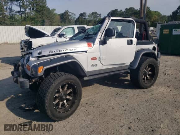 2003 Jeep Wrangler Rubicon с VIN 1J4FA69S53P375189, выставлен на аукционе Copart как лот 54292035 с пробегом 55 863 миль миль и Списание • Salvage title. История ставок и продаж доступна на DreamBid. Изображение 1.