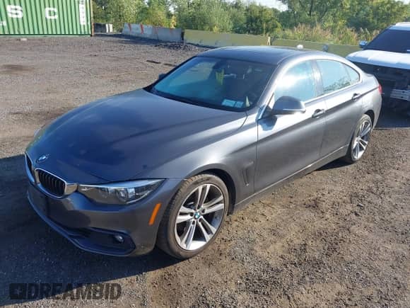 2019 BMW 4 Series 430i xDrive z VIN WBA4J3C56KBL10486, wystawiony jako IAAI lot #43197486 z przebiegiem 57 378 mil mil oraz . Historia ofert i sprzedaży dostępna na DreamBid. Obrazek 2.