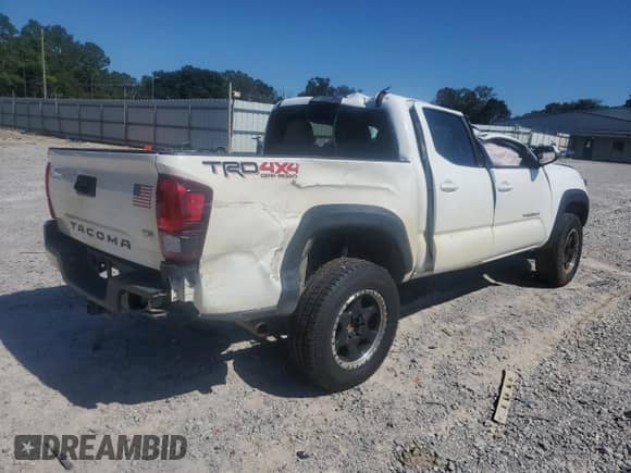 2019 Toyota Tacoma TRD Off Road z VIN 3TMCZ5AN9KM282522, wystawiony jako Copart lot #85939905 z przebiegiem 89 447 mil mil oraz Nie do naprawy • Non repairable. Historia ofert i sprzedaży dostępna na DreamBid. Obrazek 3.