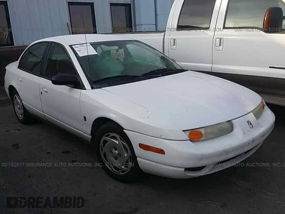2001 Saturn SL with VIN 1G8ZK52781Z351108, listed as a IAAI auction lot 19251283 with 241,448 mi miles and . Bid and sale history available at DreamBid. Image 1.