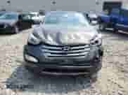 2014 Hyundai Santa Fe z VIN 5XYZUDLB0EG216206, wystawiony jako Copart lot #66904365 z przebiegiem 120 926 mil mil oraz Czysty tytuł • Clean title. Historia ofert i sprzedaży dostępna na DreamBid. Obrazek 5.