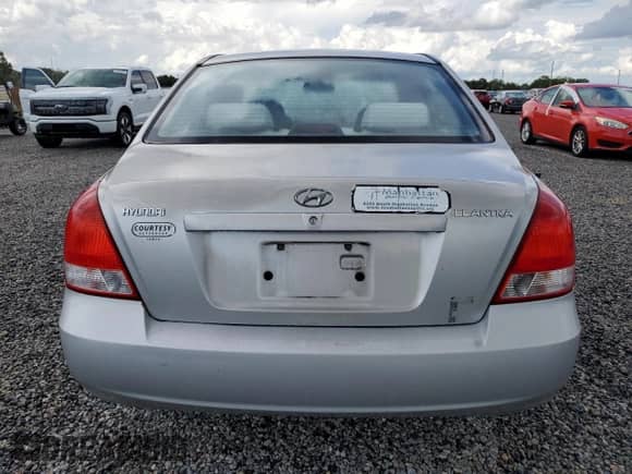 2003 Hyundai Elantra GLS с VIN KMHDN45D23U546491, выставлен на аукционе Copart как лот 73928814 с пробегом Не указан миль и Списание • Salvage title. История ставок и продаж доступна на DreamBid. Изображение 6.