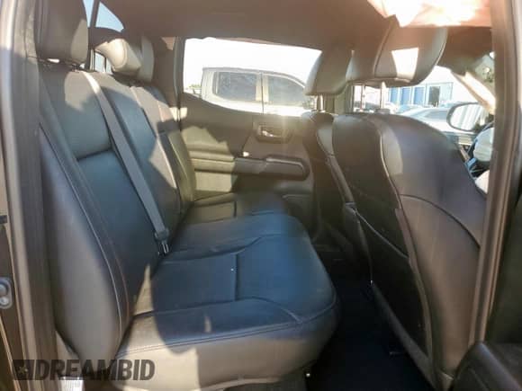 2018 Toyota Tacoma TRD Pro с VIN 5TFCZ5AN0JX156137, выставлен на аукционе Copart как лот 81966775 с пробегом 90 905 миль миль и Списание • Salvage title. История ставок и продаж доступна на DreamBid. Изображение 10.