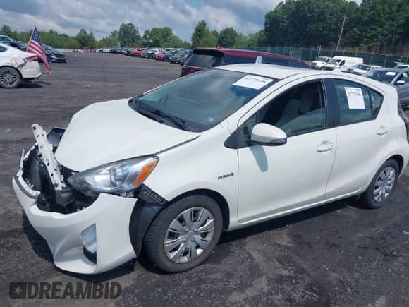 2015 Toyota Prius One z VIN JTDKDTB37F1094645, wystawiony jako IAAI lot #42779146 z przebiegiem 149 416 mil mil oraz . Historia ofert i sprzedaży dostępna na DreamBid. Obrazek 2.