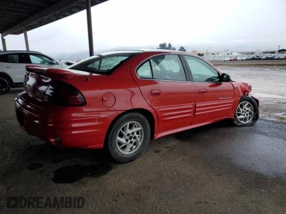 2001 Pontiac Grand Am SE1 с VIN 1G2NF52EX1C242261, выставлен на аукционе Copart как лот 82236874 с пробегом 184 935 миль миль и Списание • Salvage title. История ставок и продаж доступна на DreamBid. Изображение 3.